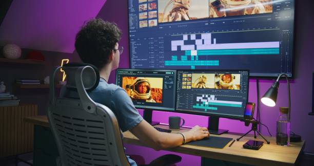 istock Young editor works at home office, edits sound tracks for video 1621378699
