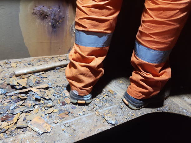 istock tapping of rust in a ballast tank on a ship 1621379245