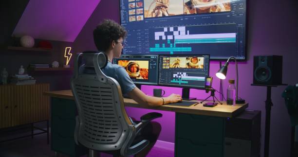 istock Young editor, video maker edits sound tracks for movie 1621379755
