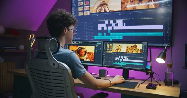 istock Young editor, video maker edits sound tracks for movie 1621380789