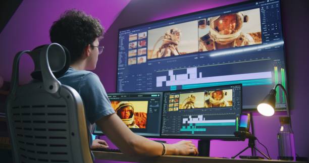 istock Young editor, video maker edits sound tracks for movie 1621381813