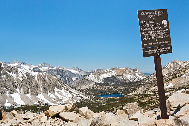 Entering Kings Canyon National Park Entering Kings Canyon National Park at Kearsarge Pass. Sierra Nevada, California, USA. pacific crest trail stock pictures, royalty-free photos & images