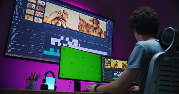 istock Young video maker edits movie about space mission 1621387057