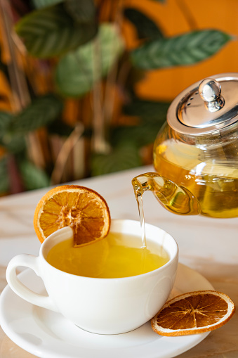 Herbal Tea In Pot With Empty Tea Cup