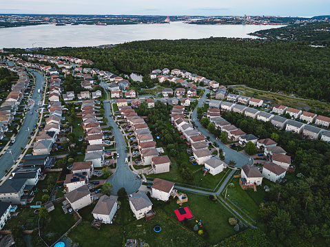 Aerial view of a suburban landscape at dusk.