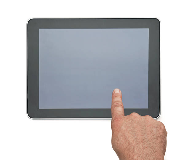 рука, которая на что-то указывает на цифровой планшетный пк - close up touchpad computer index finger стоковые фото и изображения