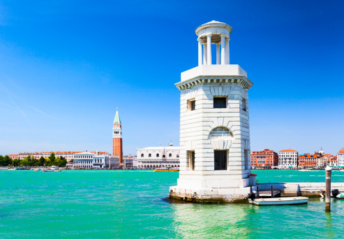 Old town of Venice with church tower of Basilica di Santa Maria Gloriosa dei Frari on a sunny summer day. Photo taken August 7th, 2023, Venice, Italy.