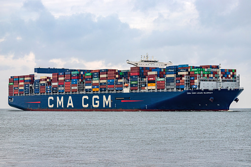 Cuxhaven, Germany - October 26, 2021: 20,600 TEU container ship CMA CGM Louis Bleriot on the river Elbe