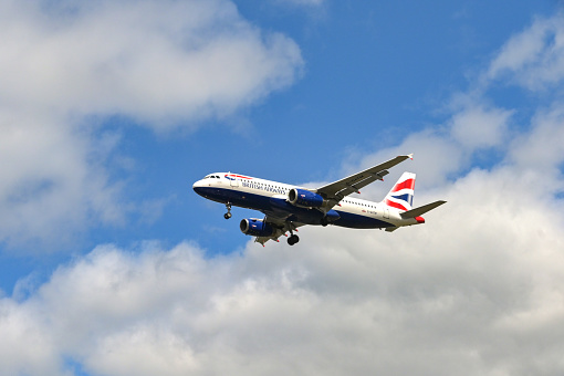 London, England, UK - 1 August 2023: Airbus A320 jet operated by British Airways on final approach to land at London Gatwick airport.