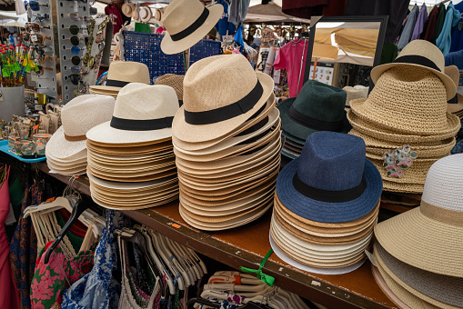 Many hats are sold at a stall