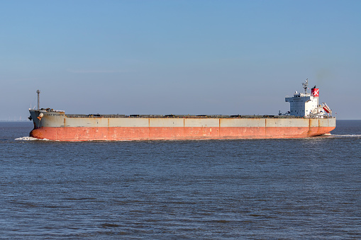 Cuxhaven, Germany - October 24, 2021: “K” Line bulk carrier Lily Atlantic on the river Elbe
