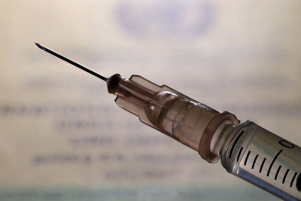 istock needle on syringe with vaccine 1621425946