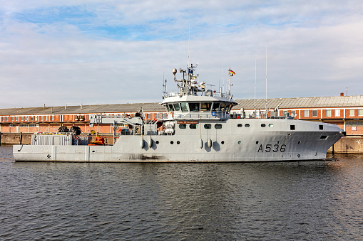 HMS Argyll moored at Royal Victoria Dock next to ExCel in London on a beautiful sunny autumn day.