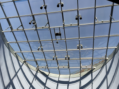Glass roof of a modern building. Glass ceiling of the building.