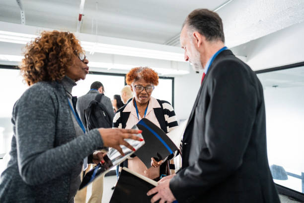 istock Coworkers talking during a business conference 1621466133