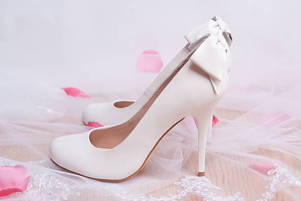 istock Luxury white wedding shoes with bows. 162146618