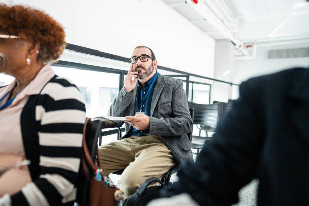 istock Mature businessman during a business seminar 1621466655