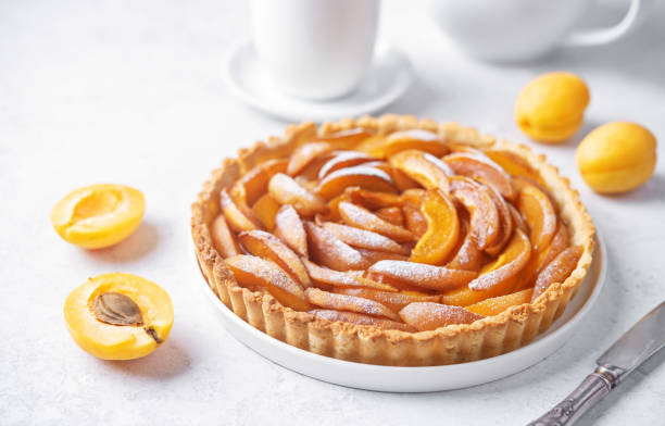istock Apricot tart with sugar sprinkle in a plate 1621473868