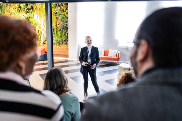 istock Young businesswoman talking during a presentation on a modern office 1621479761