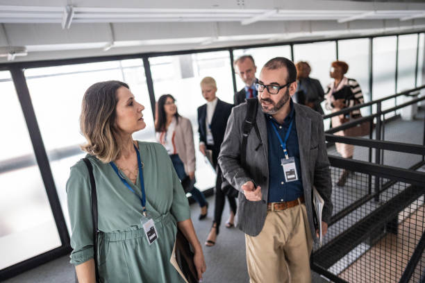 istock Business people walking and talking on a office or seminar 1621481315