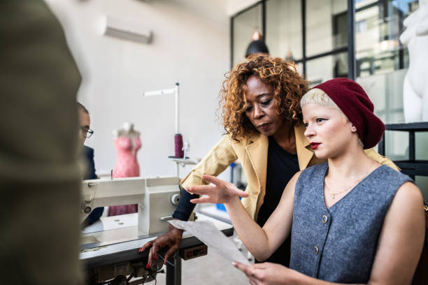 istock Tailors working on a meeting in studio atelier 1621485430