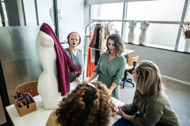 istock Tailors working on a meeting in studio atelier 1621494376