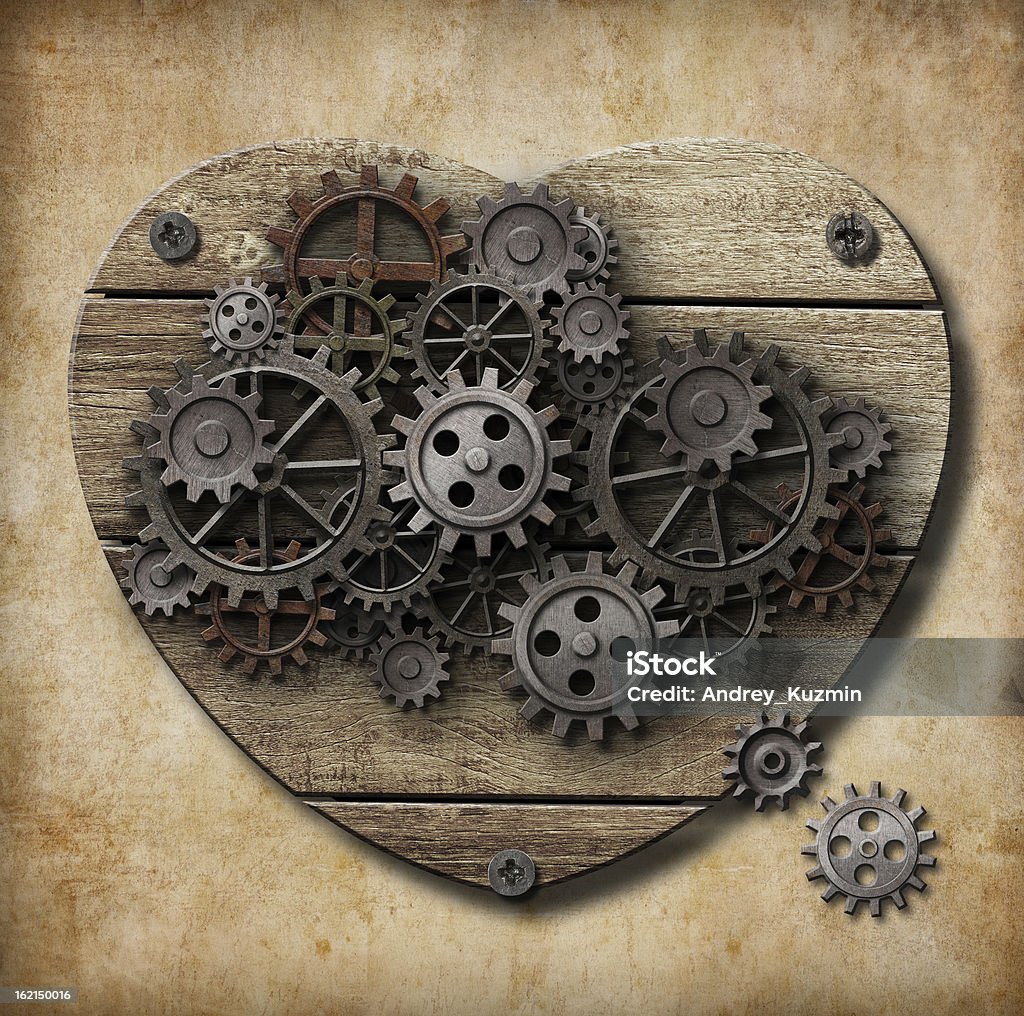 Aged human heart model made of rusty metal gears Gear - Mechanism Stock Photo