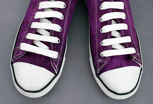 istock Purple color canvass shoes. 162150558