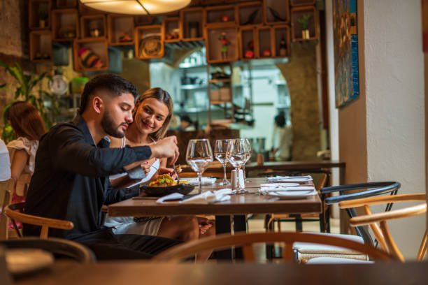 istock Couple is eating in a fancy restaurant 1621517885