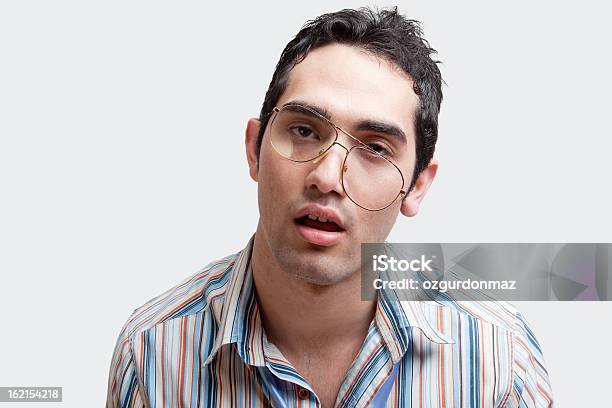 Nerd Hombre Joven Foto de stock y más banco de imágenes de Cansado - Cansado, Foto de estudio, Humor