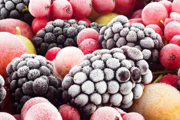 istock Frozen mixed berries, front view - red currant, white currant, blackberry, gooseberry and black currant. 1621543512