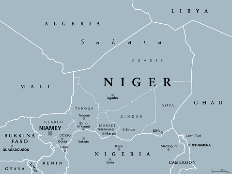 Niger, landlocked country in West Africa, gray political map with borders, regions, capital Niamey and largest cities. The Republic of the Niger, a unitary state. Most of its area lies in the Sahara.