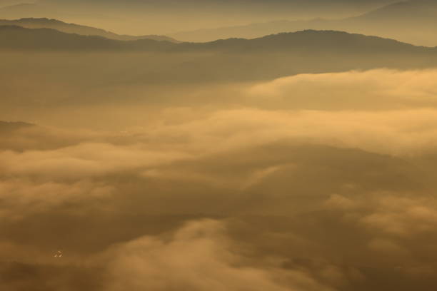 istock sunrise and sea of clouds 1621573846