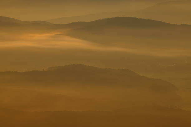 istock sunrise and sea of clouds 1621575112
