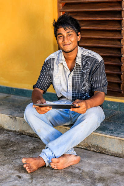 istock Sri Lankan teenager using a digital tablet 1621657368