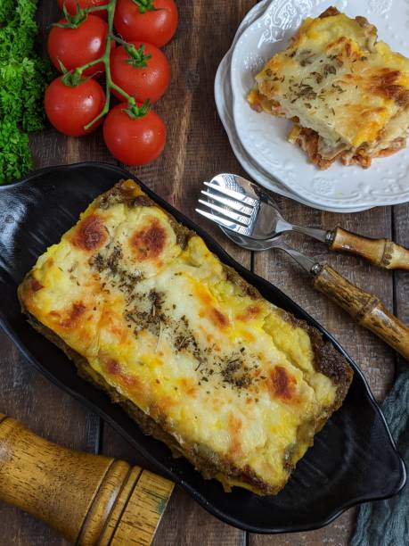 istock close up of lasagna on white background 1621728358