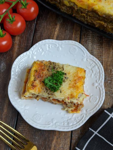 istock close up of lasagna on white background 1621731330
