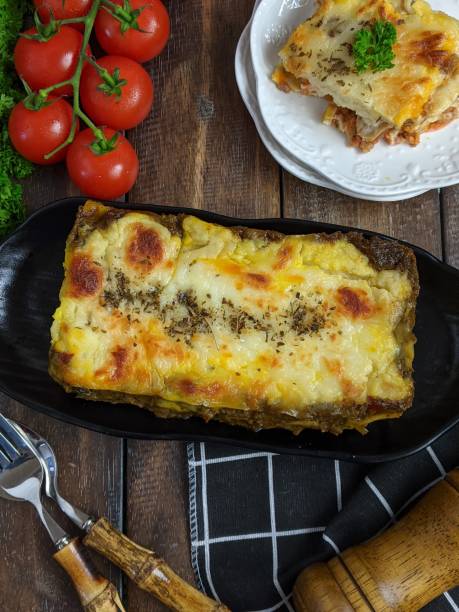 istock close up of lasagna on white background 1621741460