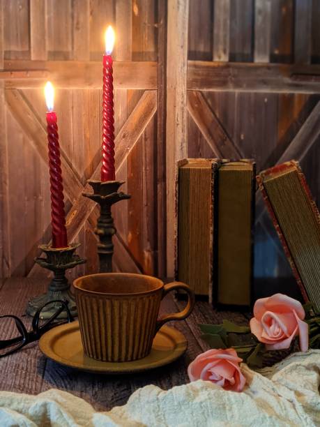 istock a cup of coffee and candle as a rustic theme 1621762146