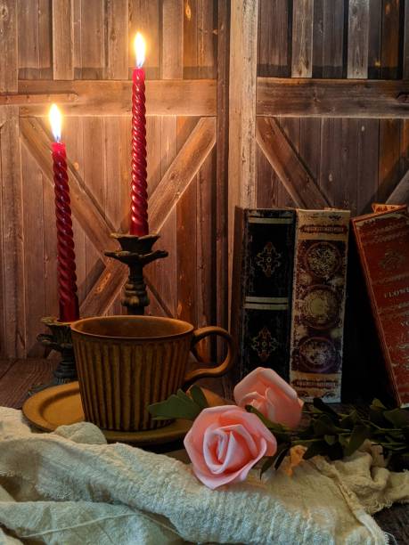 istock a cup of coffee and candle as a rustic theme 1621763223