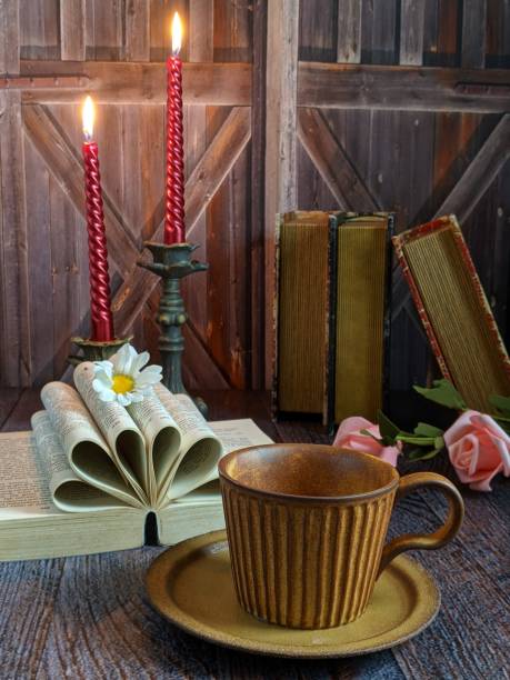 istock a cup of coffee and candle as a rustic theme 1621764280