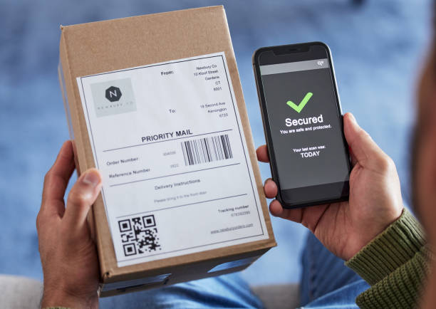 istock Cardboard box label, phone screen or person hands with security check success, safety scan or export order verification. Tick, mail or home client with mobile app, retail delivery or shopping product 1621884893