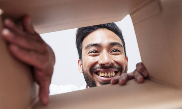 istock Open, delivery or happy man with box, gift or package with smile for courier service or ecommerce. Face, wow or customer excited by mail post order, parcel cargo or online shopping shipping present 1621888565