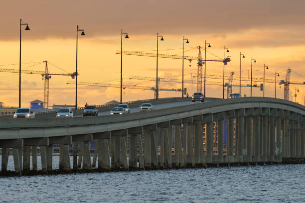 istock Barron Collier Bridge and Gilchrist Bridge in Florida with moving traffic. Transportation infrastructure in Charlotte County connecting Punta Gorda and Port Charlotte over Peace River 1621910412