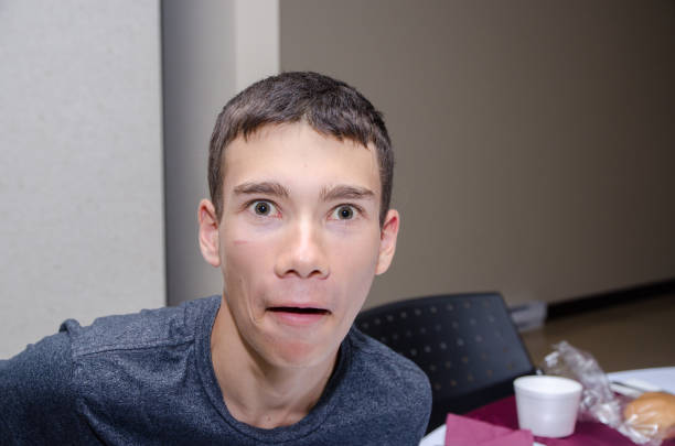 Headshot of Teenage boy making funny face