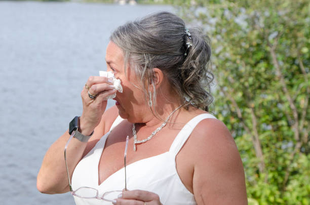 istock Bride wiping tears of joy 1621961008