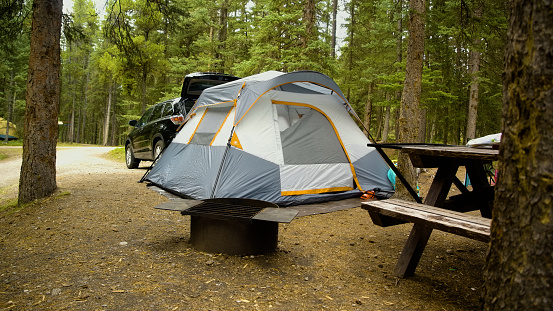 Tent camping outdoors summer campground adventure, camping gear