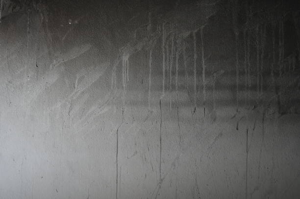 istock dirty black wall was burn from fire, construction industry 1622000832