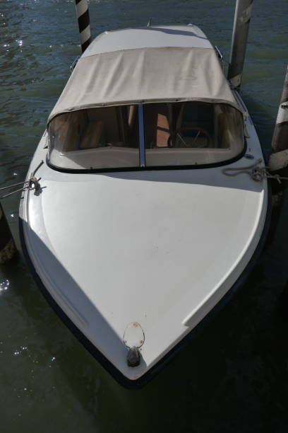 istock White boat with covered roof and steering wheel 1622052074