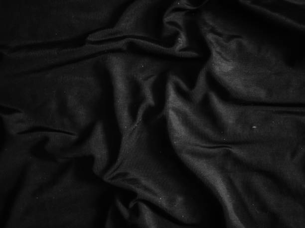 istock soft black cloth background, silk, elegant, monochrome, elegant black cloth background. blurry. satin 1622055584